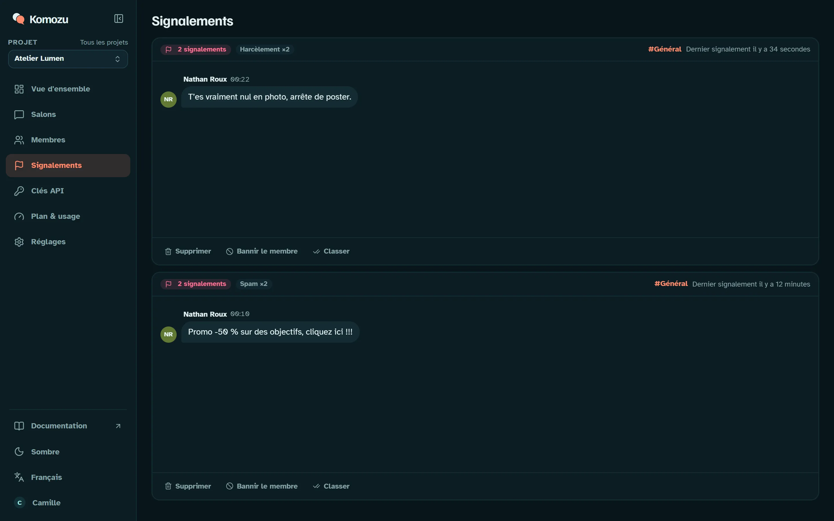 Page des signalements du dashboard Komozu avec un message signalé deux fois comme spam