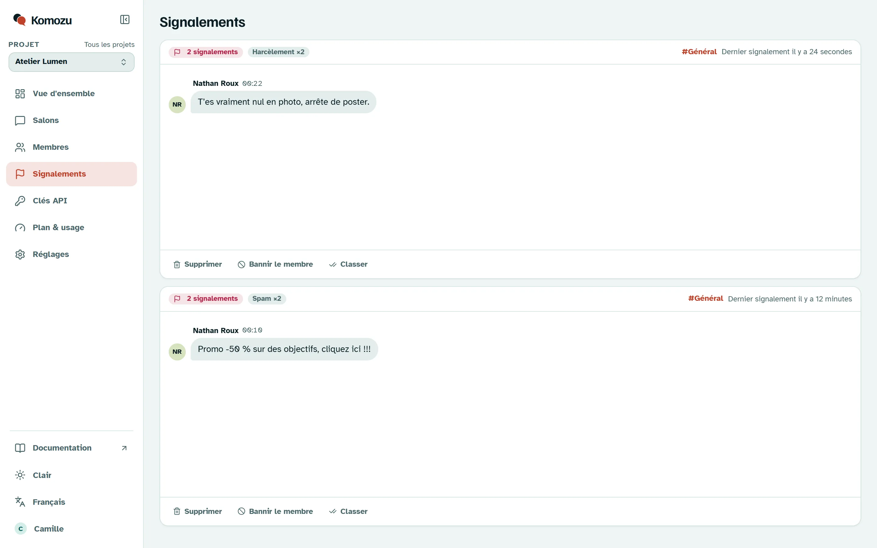 Page des signalements du dashboard Komozu avec un message signalé deux fois comme spam